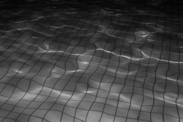 Picture of Water in a night pool with a square tile