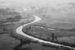 Picture of Artistic foggy black and white sunrise landscape from above