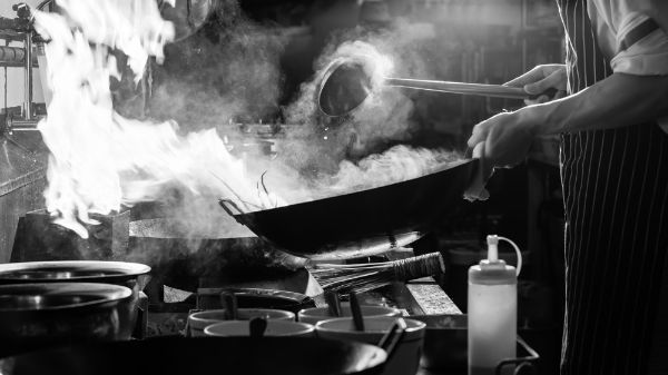 Picture of Chef is stirring vegetables